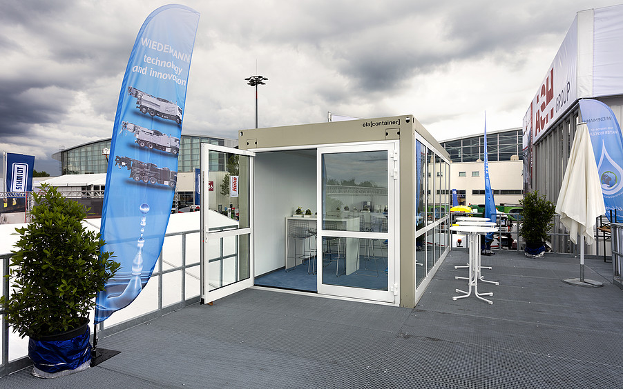 Unternehmen präsentiert sich in Raumlösung von ELA ELA Container - Messeauftritt Wiedemann 2