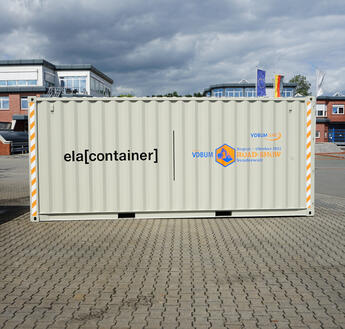 ELA Roadshow-Container mit VDBUM-Roadshow-Banner