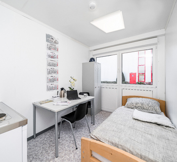 Wohncontainer mit Bett und Küche
